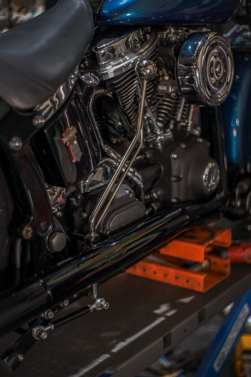 Chrome center stand fitted to a Harley-Davidson Softail